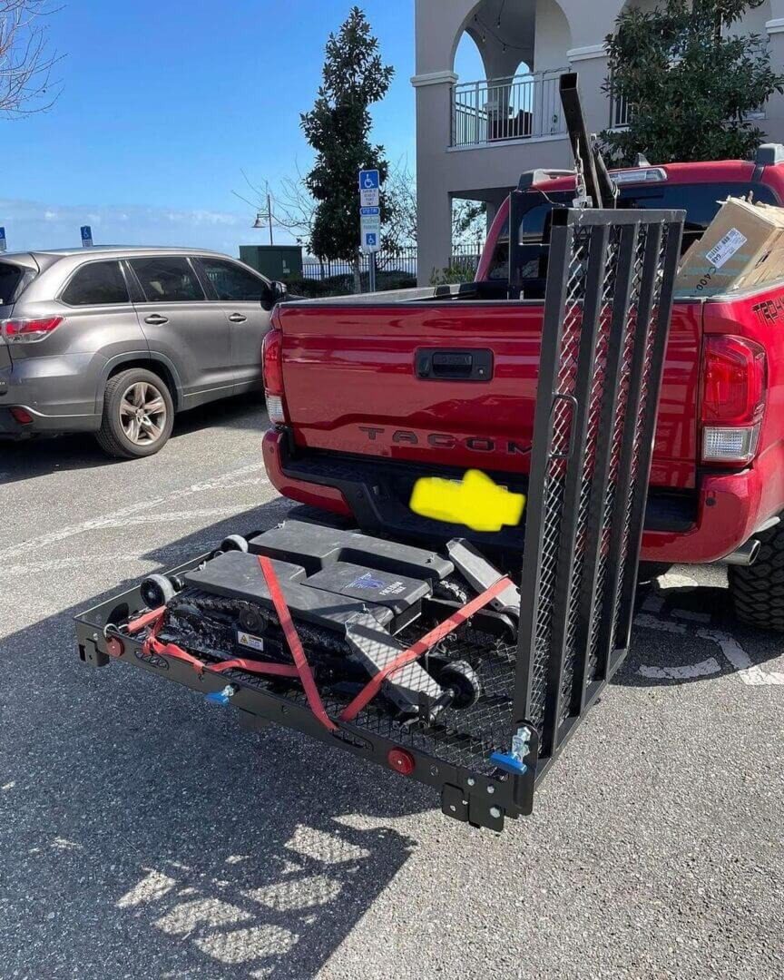 Truck tailgate featuring metal ramp accessory